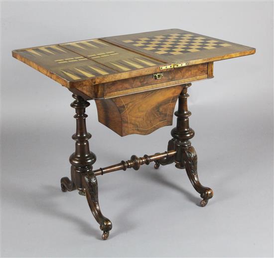 A Victorian figured walnut and Tunbridgeware combined games and work table, W.1ft 11in. D.1ft 5in. H.2ft 5in.